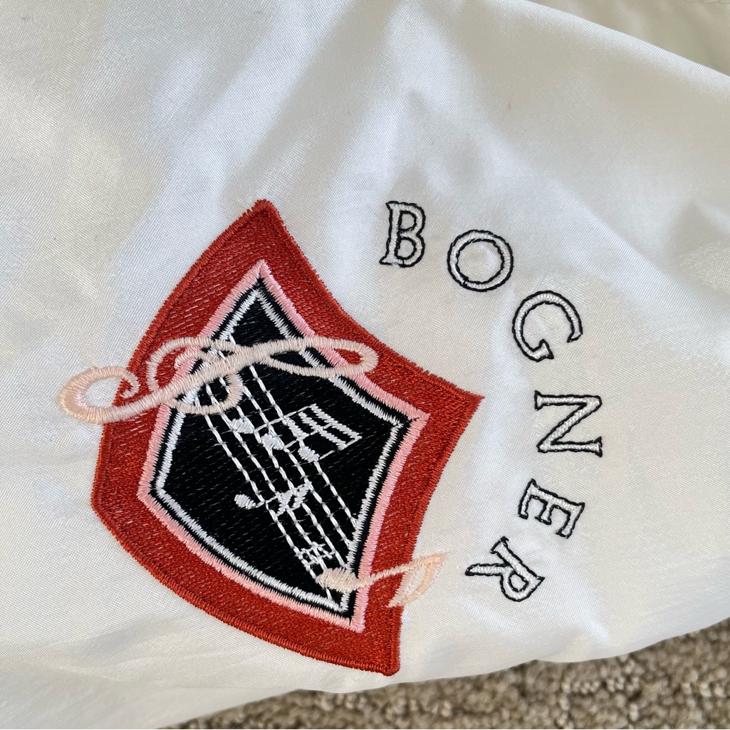 Bogner Women's White Puffer Jacket With Musical Notes Detail On Sleeve